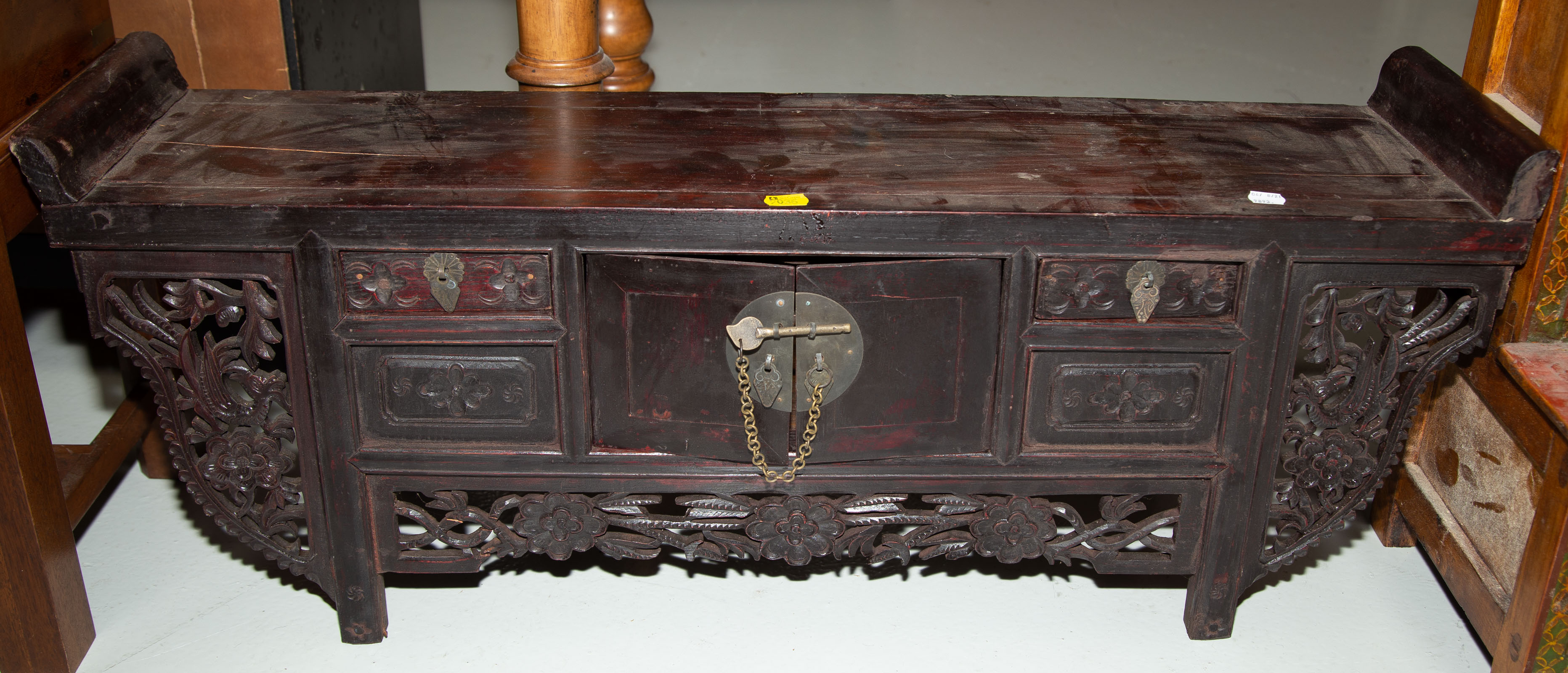 Appraisal: CHINESE CARVED HONGMU DOMESTIC SHRINE CABINET th century in H