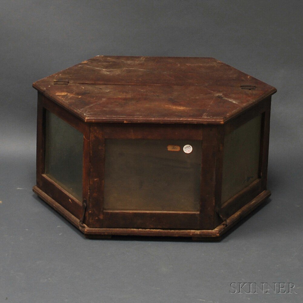 Appraisal: Red-painted Hexagonal Hinged Display Case late th century each facet