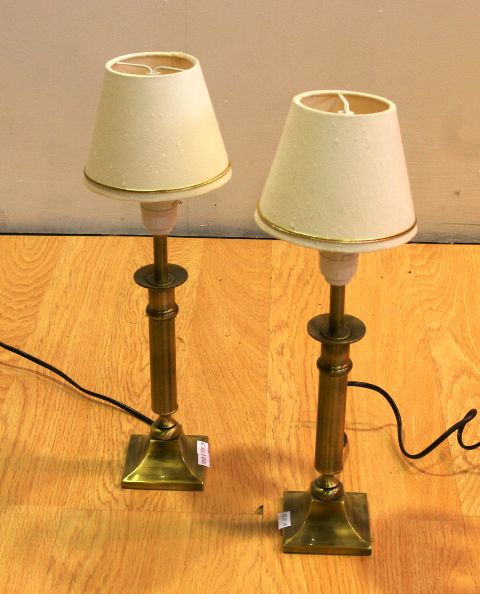 Appraisal: A pair of th century brass table lamps cm high