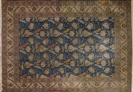 Appraisal: TABRIZ CARPET The blue field with leaf and flower overlay