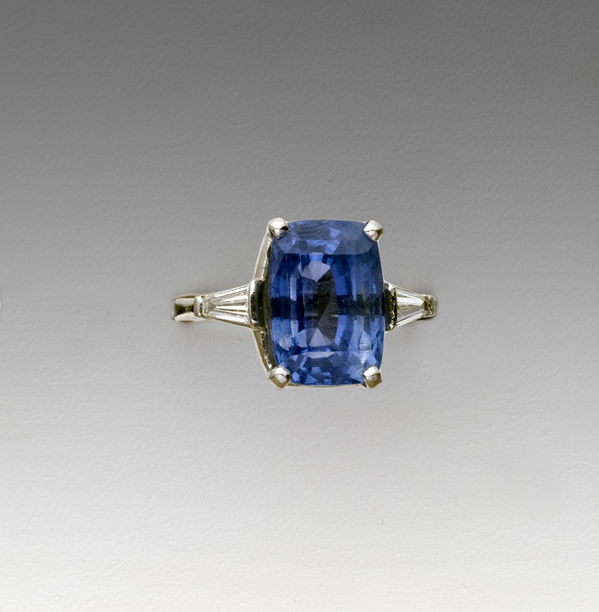 Appraisal: SAPPHIRE DIAMOND AND PLATINUM RING The ring is set with