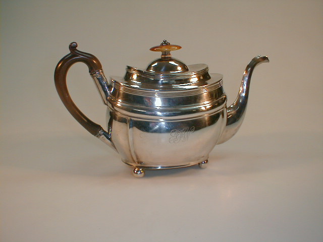 Appraisal: A George III silver teapot on ball feet London Maker