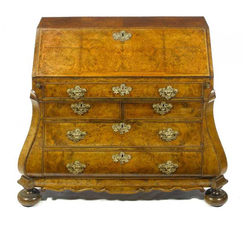 Appraisal: A DUTCH WALNUT AND BURR WALNUT BUREAU the crossbanded flap