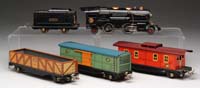 Appraisal: LIONEL O GAUGE E TIN LOCOMOTIVE MATCHING TENDER THREE FREIGHT