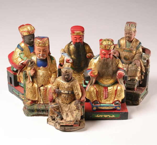 Appraisal: Six Chinese seated wooden temple figures paint and gilt decoration