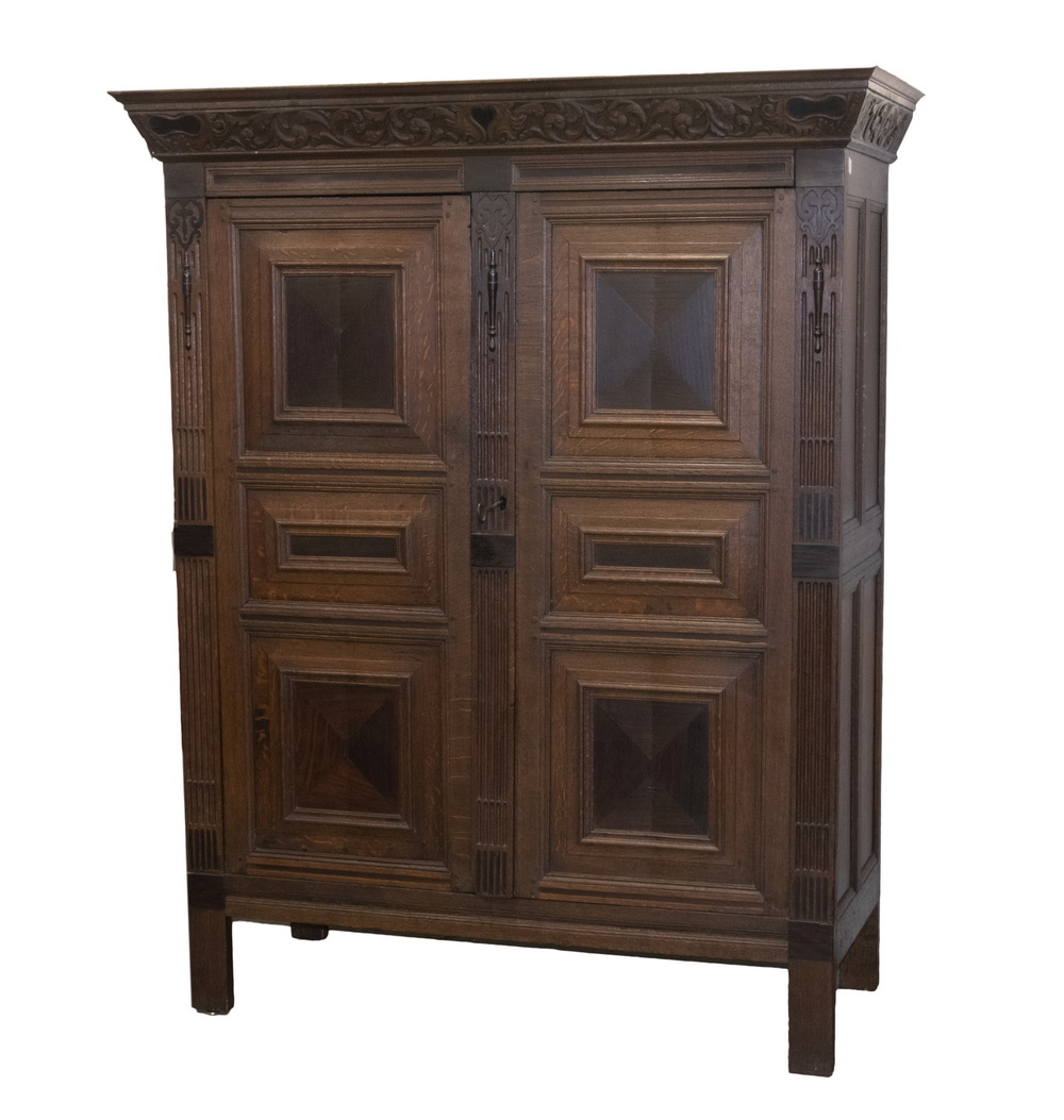 Appraisal: DUTCH OAK CABINET th c Tall Cabinet pegged construction with