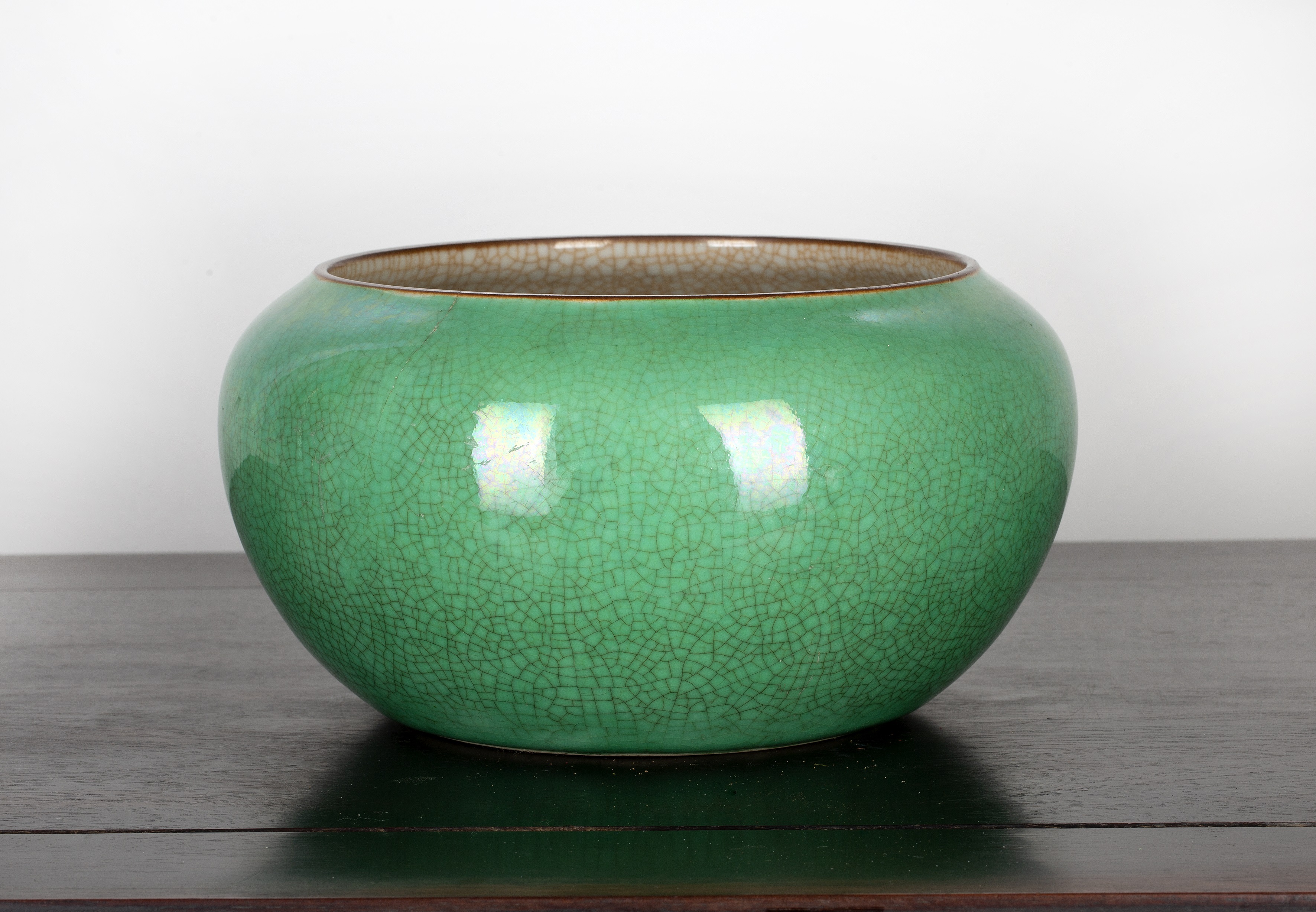 Appraisal: Large green porcelain bowlChinese th Century with all over crazing