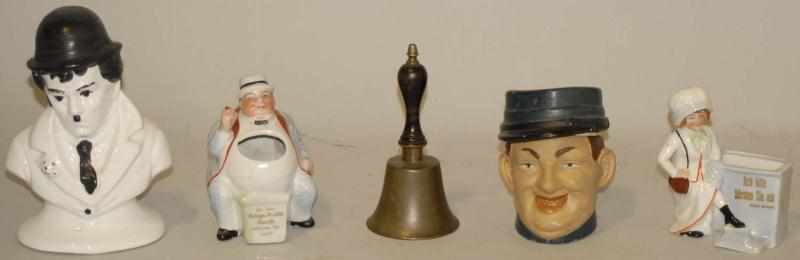 Appraisal: Four Bisque Figural Items One Bell One Charlie Chaplan figurine