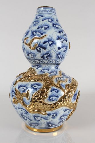 Appraisal: A CHINESE CALABASH-FORTUNE PLATED DRAGON-DECORATING POR A Chinese Calabash-fortune Plated