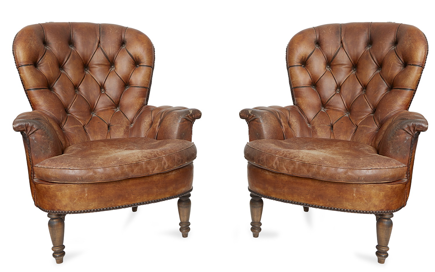 Appraisal: A PAIR OF BUTTON BACK TAN LEATHER ARMCHAIRS EARLY TH