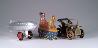 Appraisal: LOT OF TIN TOYS An egg laying hen by Baldwin