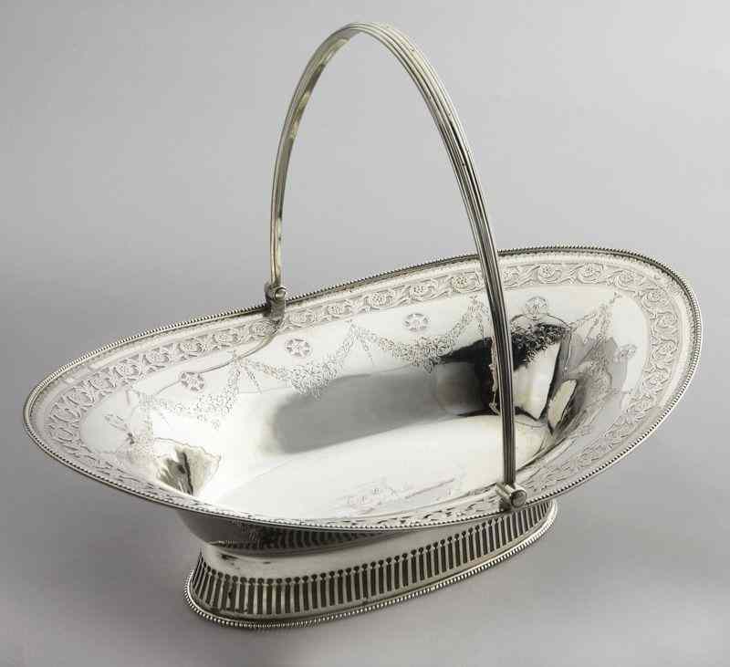 Appraisal: George III sterling cake basket by Robert HennellI with a