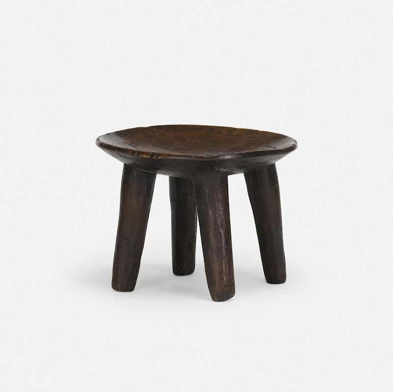 Appraisal: African stool African stool th Century carved and lacquered wood