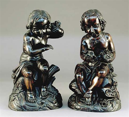 Appraisal: Italian school th century PAIR FIGURES OF PUTTI carved stained