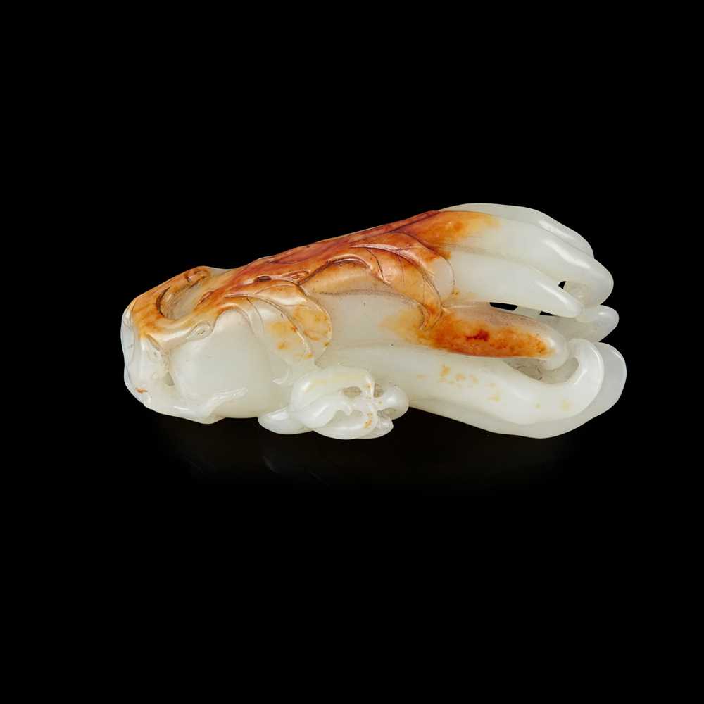 Appraisal: WHITE JADE WITH RUSSET SKIN CARVING OF FINGER CITRUS QING