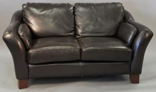 Appraisal: Dark chocolate brown leather love seat with matching ottoman Dark