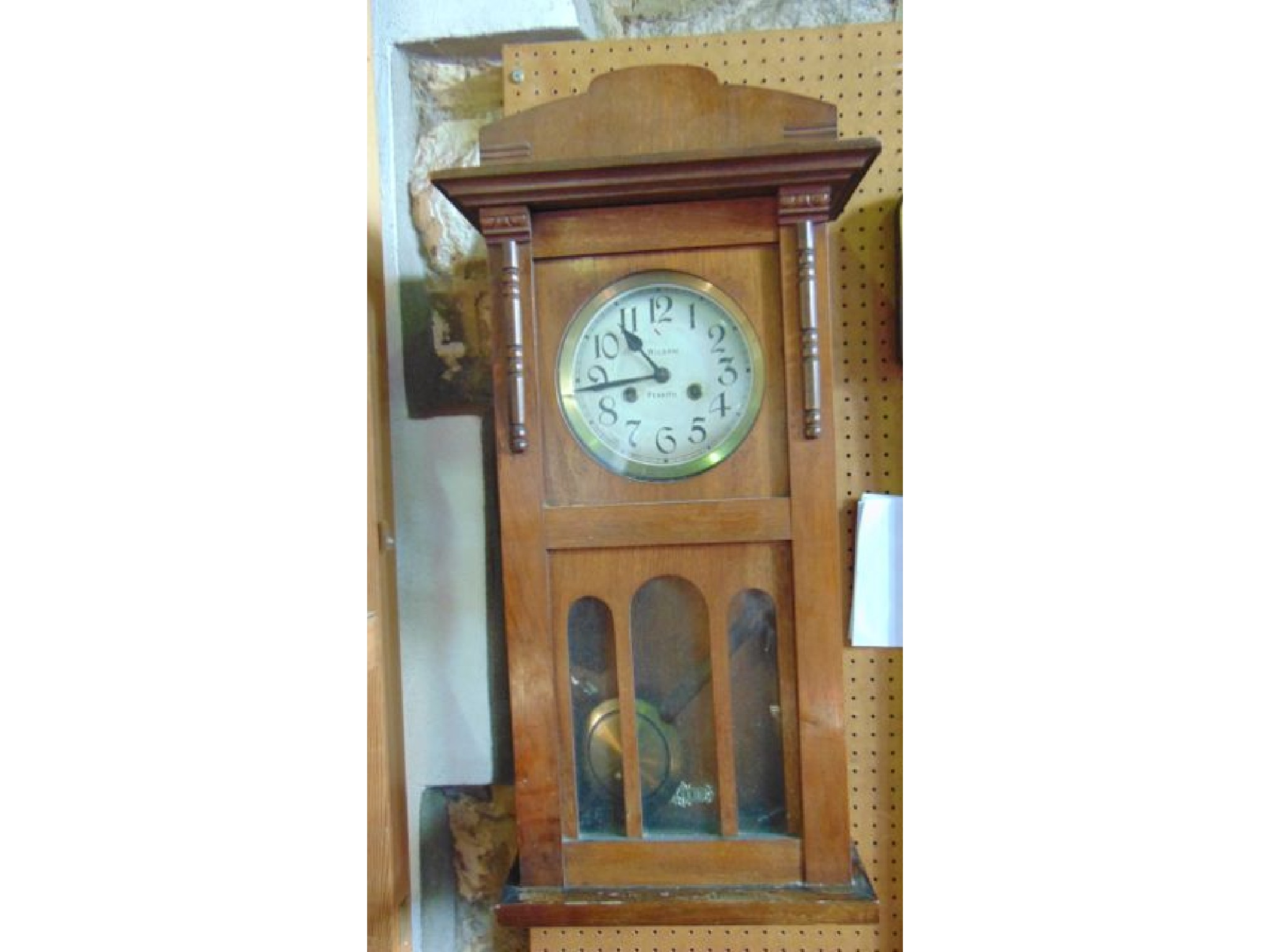 Appraisal: An early th century hanging wall clock with anodised dial