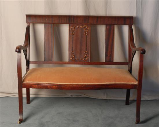 Appraisal: An Edwardian Mahogany Settee having an applied molded decorative center