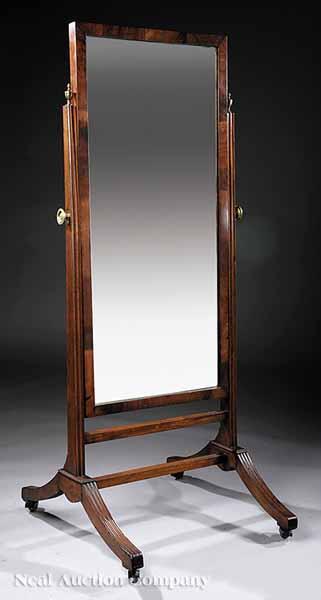 Appraisal: A Regency Mahogany Cheval Mirror early th c rectangular framed