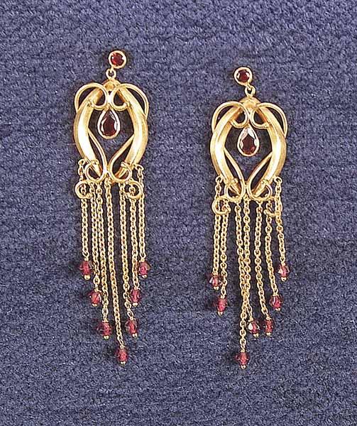 Appraisal: A Pair of kt Yellow Gold and Garnet Chandelier Earrings