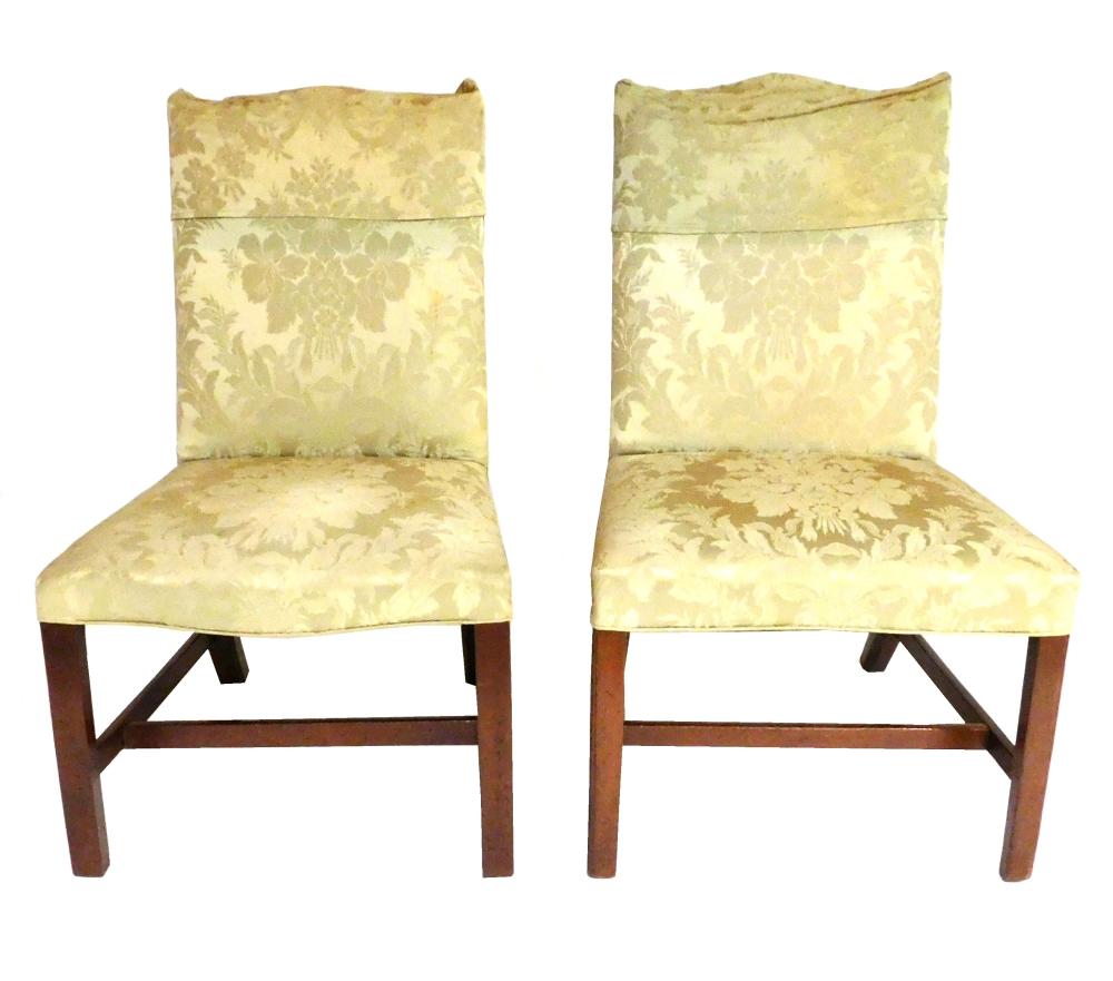 Appraisal: Pair of high back serpentine crest upholstered side chairs light