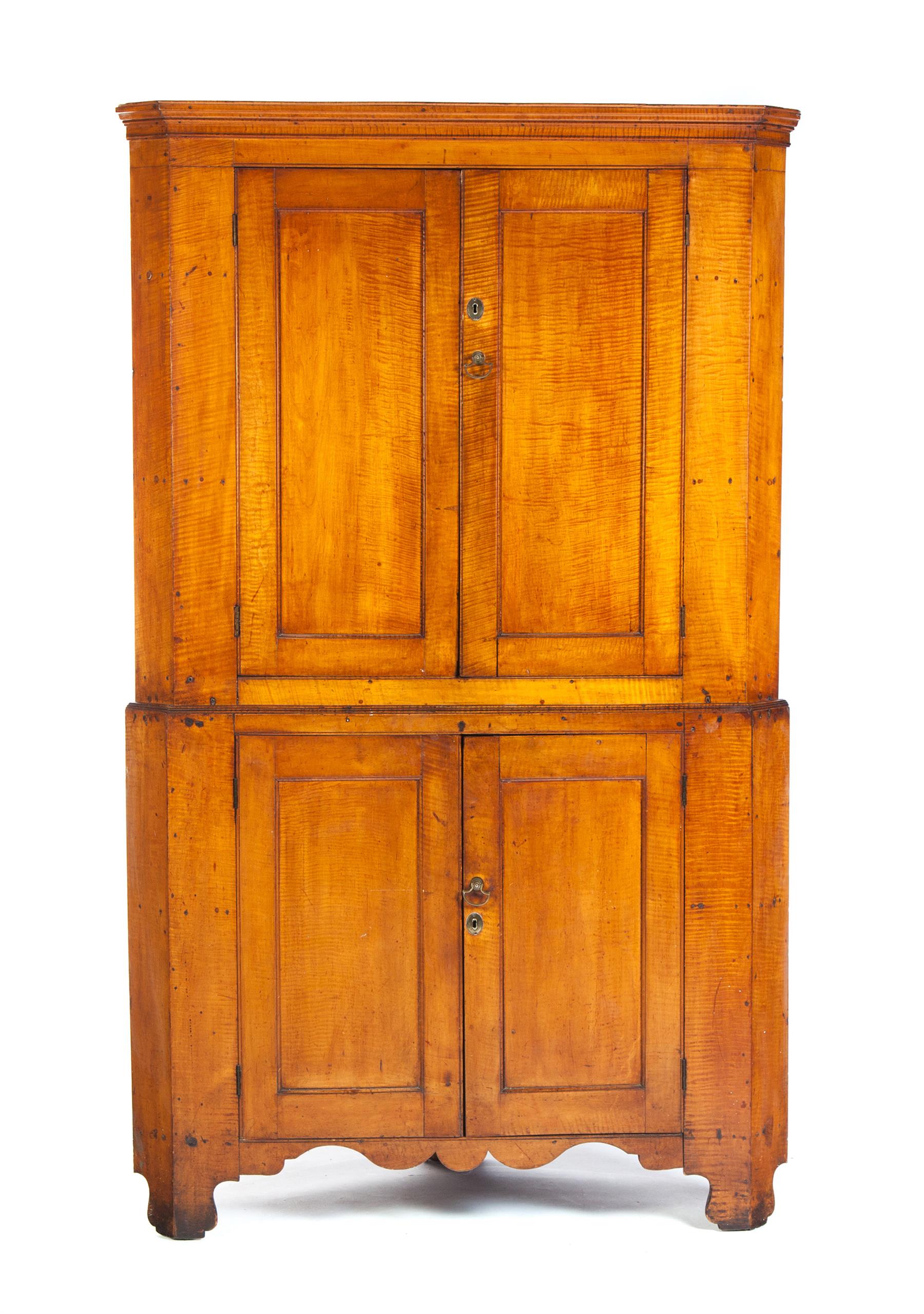 Appraisal: PENNSYLVANIA CORNER CUPBOARD Ca - curly maple Two-piece blind door