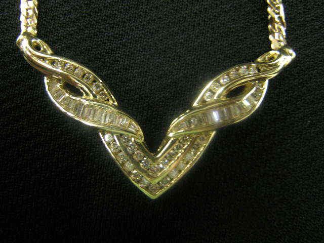 Appraisal: Diamond Necklace round baguette diamonds totaling carats in k yellow