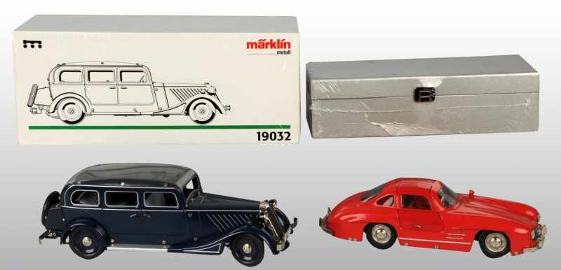 Appraisal: Lot of Tin Marklin Automobile Toys Description German Contemporary Working