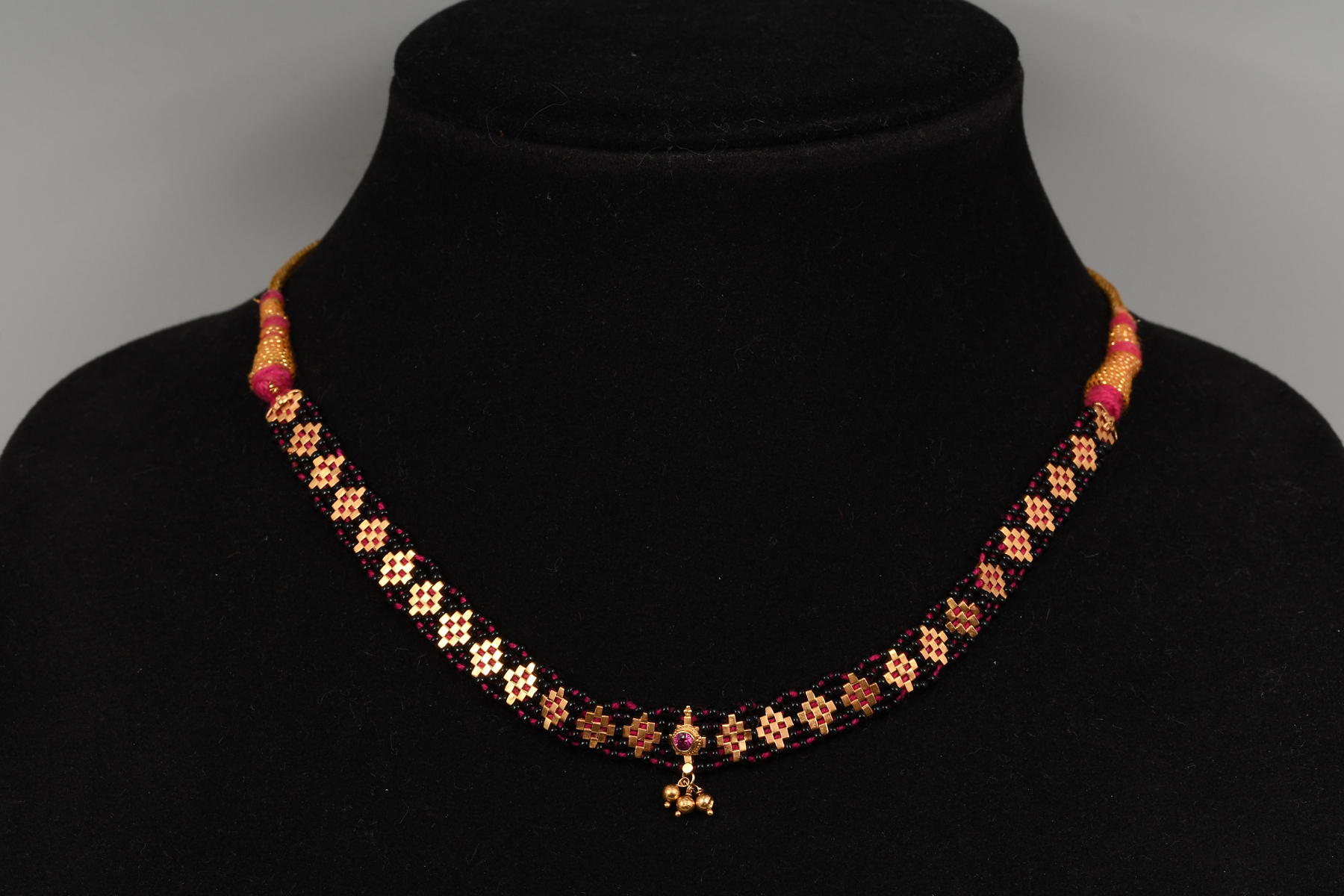 Appraisal: K YELLOW GOLD CEREMONIAL CHOKER-STYLE NECKLACE This unique necklace contains