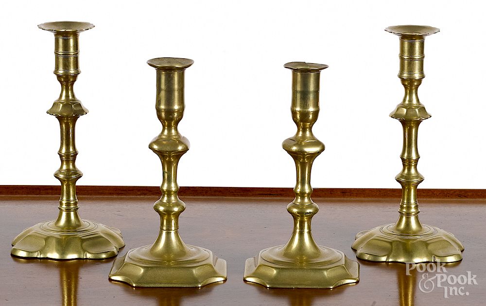 Appraisal: Two pairs of English Queen Anne brass candlesticks Exclusive on