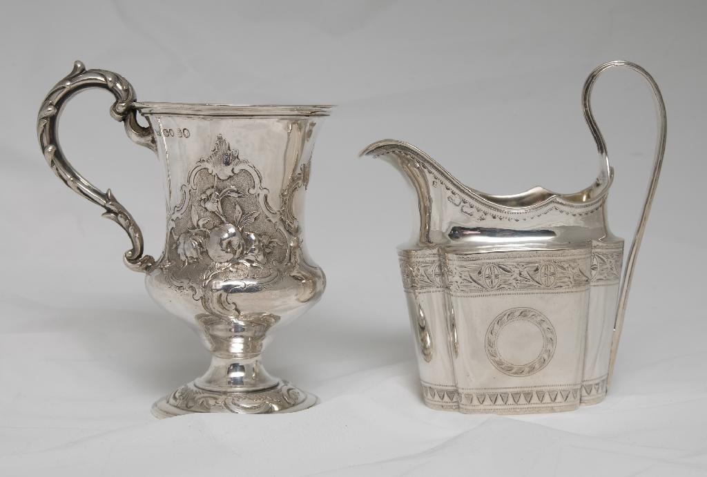 Appraisal: GEORGE III IRISH SILVER CREAM JUG WILLIAM THOMPSON DUBLIN engraved