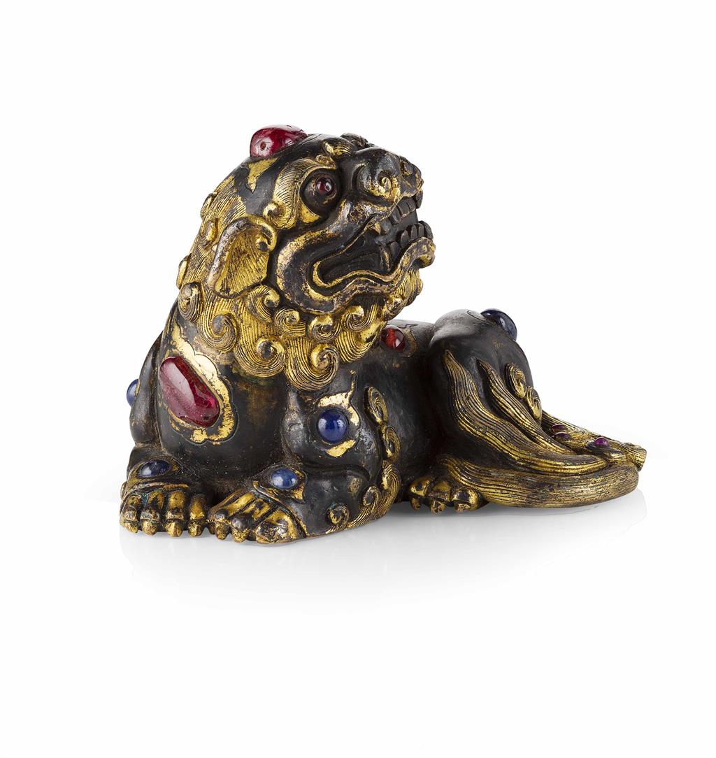 Appraisal: FINE HARDSTONE INLAID BRONZE BUDDHIST LION LATE MING EARLY QING