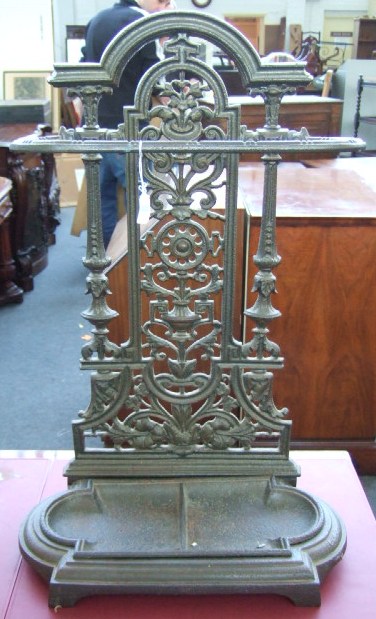 Appraisal: A Coalbrookdale style cast iron stick stand with pierced decoration