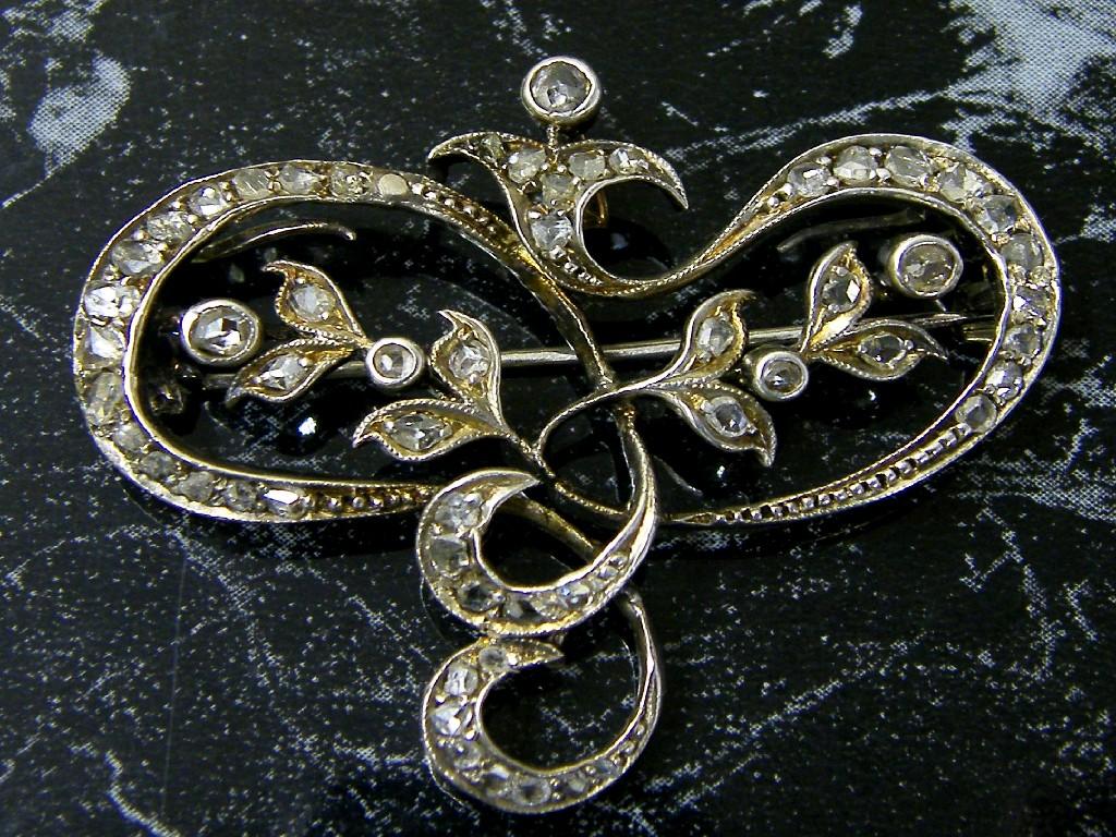 Appraisal: Attractive Art Nouveau white metal rose cut diamond brooch pendant