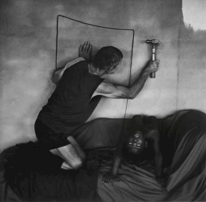 Appraisal: Roger Ballen Born Roger Ballen Born Les hammering into wall