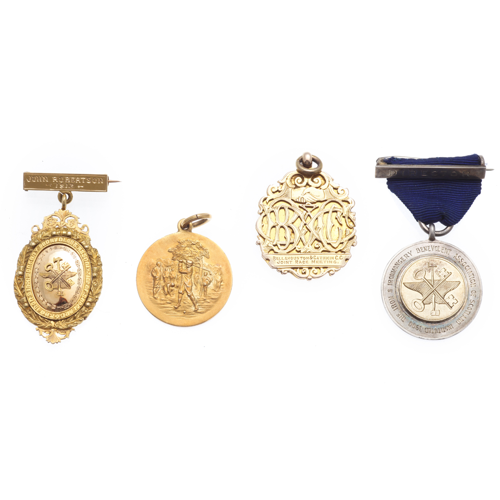 Appraisal: A collection of medals and badges to include a circular