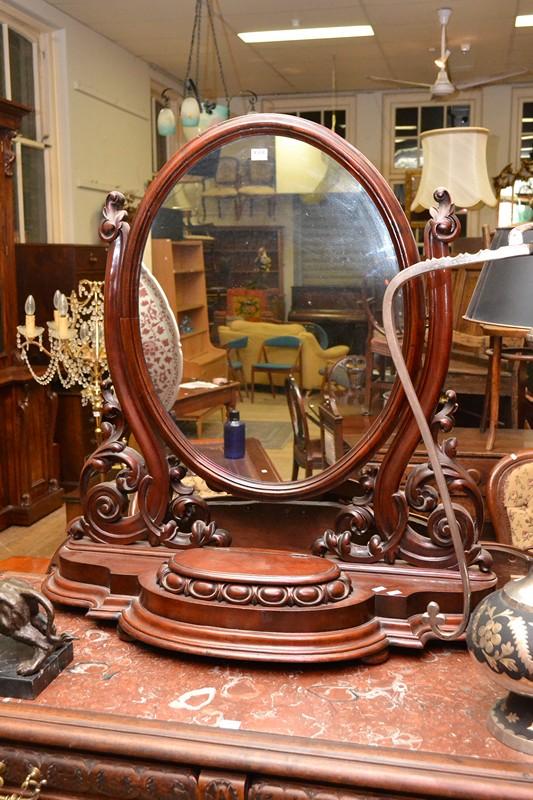 Appraisal: AN ORNATELY CARVED VICTORIAN DRESSER MIRROR