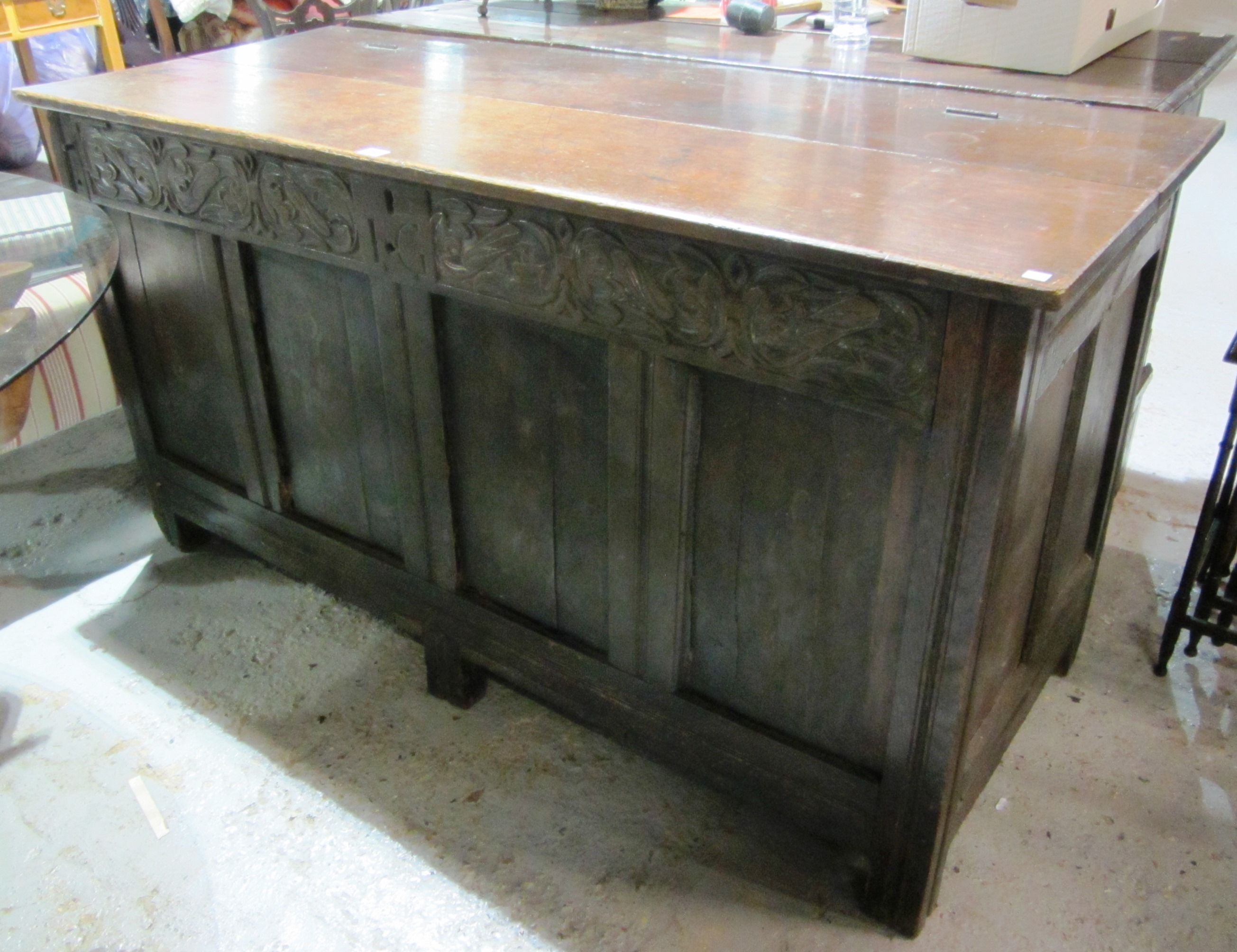 Appraisal: An th century oak coffer with carved frieze initialled 'I