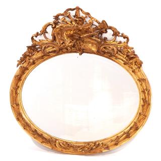 Appraisal: Large Continental Rococo giltwood oval mirror Large Continental Rococo giltwood