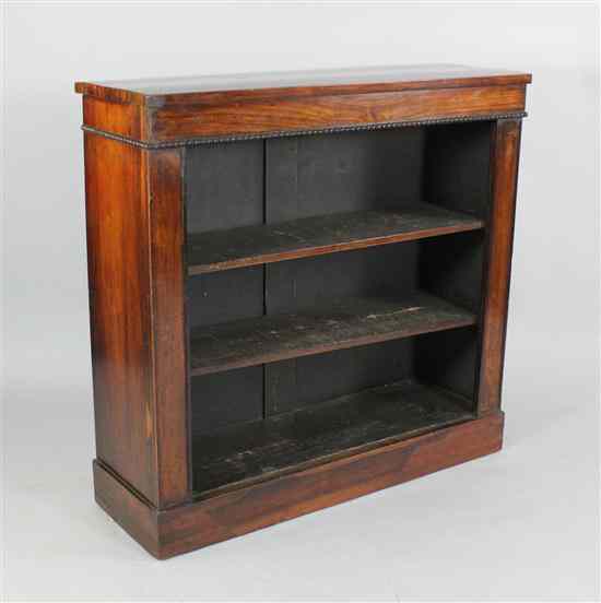 Appraisal: A Regency rosewood dwarf open bookcase on plinth base ft