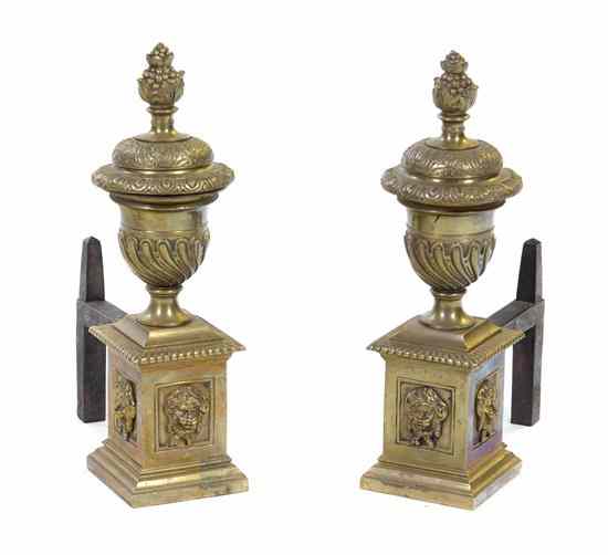 Appraisal: A Pair of Neoclassical Gilt Bronze Chenets cast with an