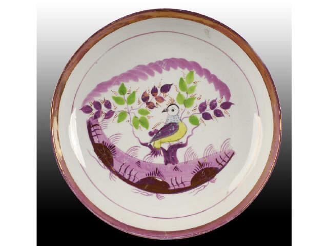 Appraisal: English Staffordshire Pink Luster Bird Plate Description Minor scratches Condition