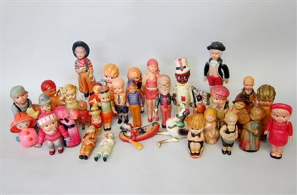 Appraisal: Collection of figural celluloid toysComprising a Harold Lloyd figure a