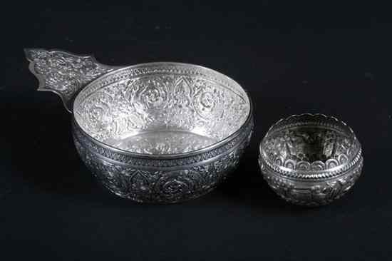 Appraisal: TWO SOUTHEAST ASIAN SILVER BOWLS One with a shaped handle