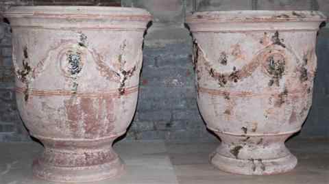 Appraisal: PAIR OF MEDIUM FRENCH ANDUZE TERRA COTTA URNS WITH GREEN