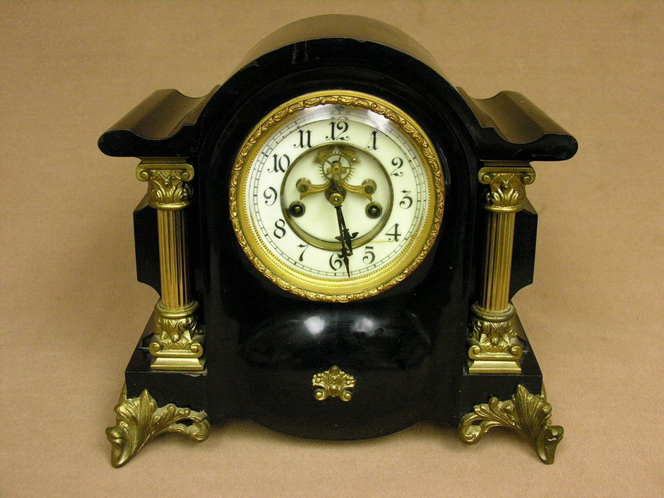 Appraisal: WATERBURY PORCELAIN CAST IRON MANTEL CLOCK crack and chip to