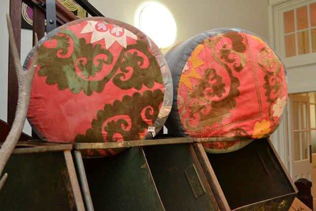 Appraisal: A PAIR OF OTTOMANS WITH PAINTED FABRIC A PAIR OF