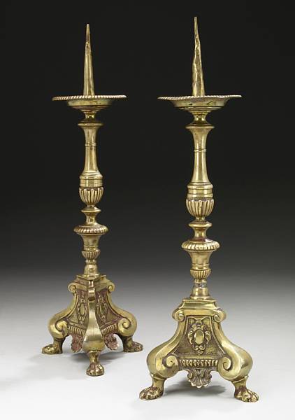 Appraisal: A pair of Venetian brass prickets th th century height