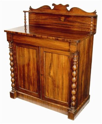 Appraisal: An early Victorian goncalo alves chiffonier with bobbin turned supports