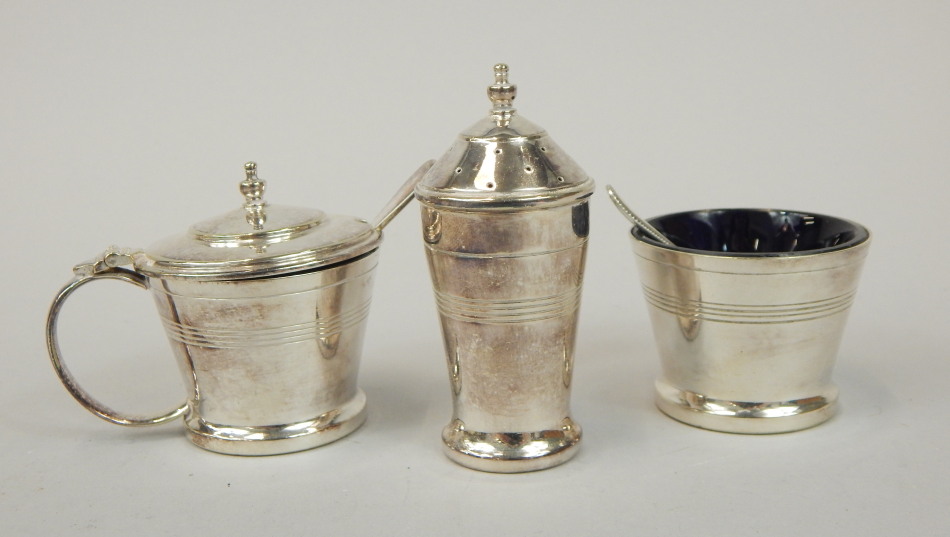 Appraisal: A silver plated Art Deco style three piece cruet comprising